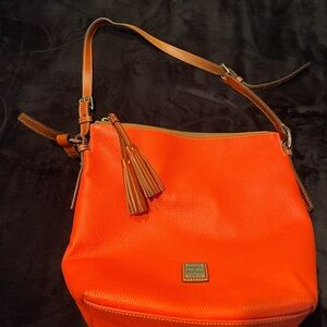 Dooney & Bourke Orange Dixon.  NWT Only used once.